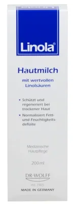 A product shot of a bottle of Linola Hautmilch.