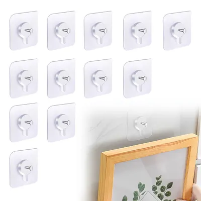 Produktbild von 12 selbstklebende Aufhängehaken für Bilder, transparente Aufhängehaken, zum Aufhängen von Bildern ohne Bohren, selbstklebende Aufhängehaken, für Gemälde, Poster, Fotos und dekorative Bilder (6 cm x 6 cm)