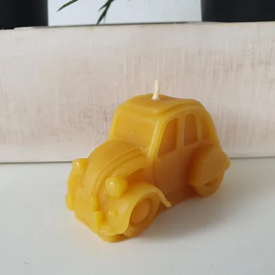 Zdjęcie produktu dla Świeczka z wosku pszczelego do samochodu „Kaczka” 4 cm