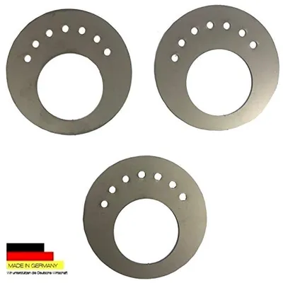 Three circular metal plates with holes arranged in a semi-circle, placed on a white background. A small German flag logo is visible in the bottom left corner.