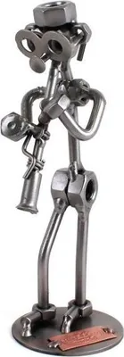 Zdjęcie produktu dla Metalowa figurka klarnecisty – ręcznie wykonana dekoracja dla muzyków