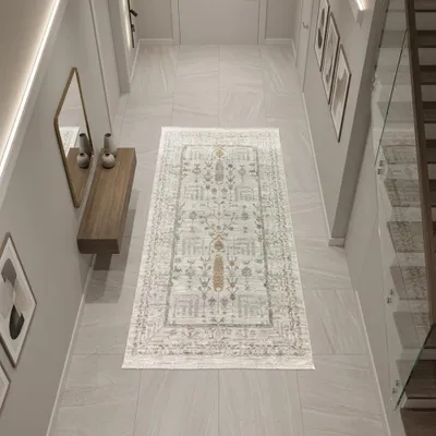 Imagen del producto de Alfombra color crema con motivos florales, flecos y diseño moderno. Tamaño: 80 x 150 cm