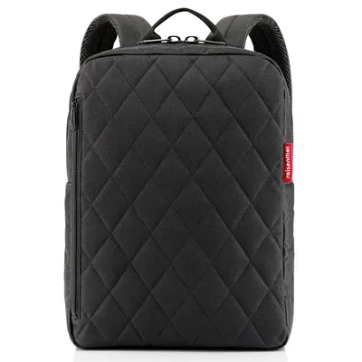 A black quilted backpack is shown against a white background.