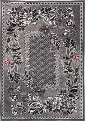 A top-down view of a rug with a floral pattern.