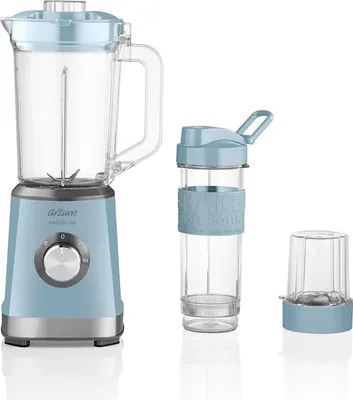 A personal blender set with a main blender unit, a travel bottle, and a small grinding cup, all against a white background.