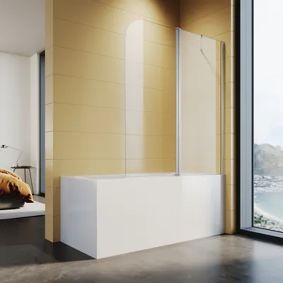 A modern bathroom with a bathtub and a glass shower screen, overlooking a scenic view.
