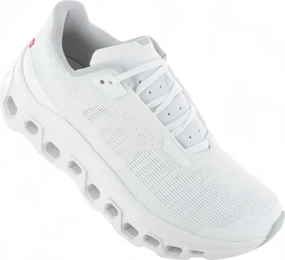 A white ON Running Cloudmonster running shoe is shown from a side angle against a white background.