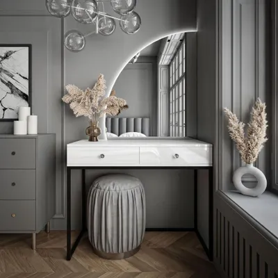 A modern dressing table with an LED mirror, stool, and decorative elements in a gray room.