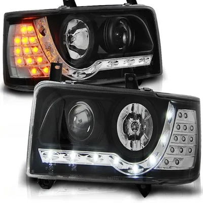 Productafbeelding van LED-koplampen met dagrijverlichting, geschikt voor VW T4 bus, bouwjaar 1990-2003, zwart, met LED-knipperlichten