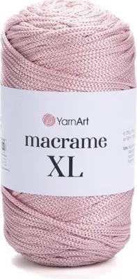 A spool of pink yarn on a white background.