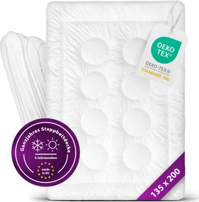 A white duvet folded and presented on a white background.