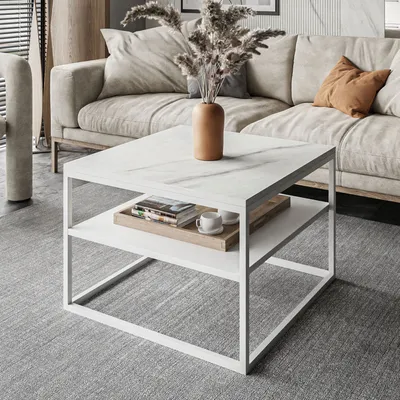A modern living room scene with a couch and a coffee table.