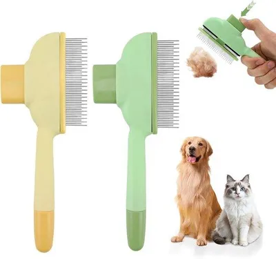 Immagine prodotto di Pettine autopulente per gatti Famanu - 2 pezzi, plastica ABS, acciaio inossidabile, impugnatura ergonomica, per cani e gatti
