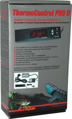 The image shows the front of a product box for a digital thermostat, with a picture of the thermostat and some of its features listed. A lizard and some plants are also visible at the bottom.