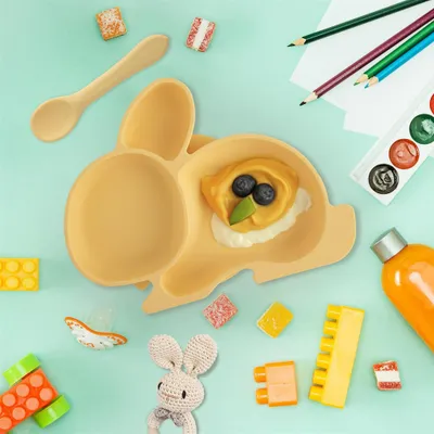 Produktbild von ORION Teller 23 × 18 cm Kinderteller geteilter Hase Silikon gelb