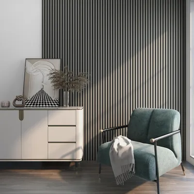 A modern living room scene with a sideboard, artwork, and a chair.