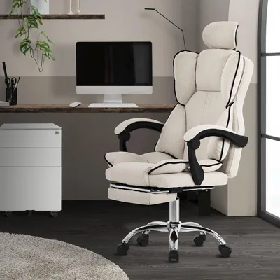An office chair is shown in a home office setting with a desk, computer, and filing cabinet.
