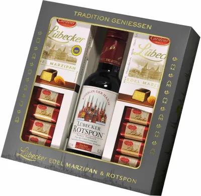 A gift set containing marzipan and a bottle of Rotspon wine, presented in a box.