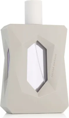 A perfume bottle with a geometric design and a white cap.