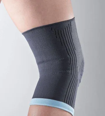 Produktbild von Thuasne Genu Action Kniebandage - 2 - Universell - Grau
