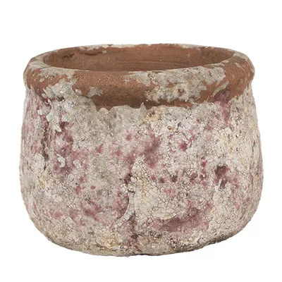 A close-up studio shot of a single, weathered terracotta pot with a pinkish hue and a textured, cracked surface.
