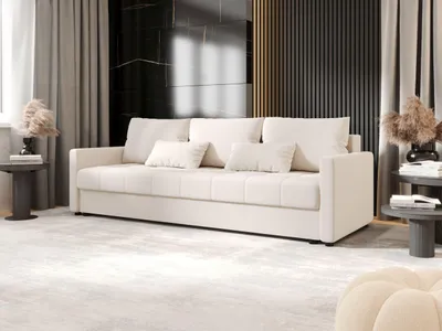 A modern living room with a beige sofa, decorative elements, and curtains.