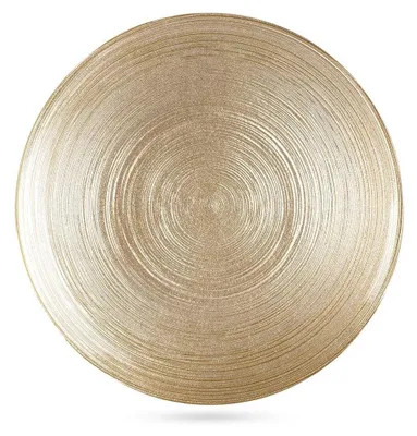 A gold glass dessert plate with a textured, concentric ring pattern.