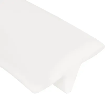 A close-up, angled view of a white mattress bridge.