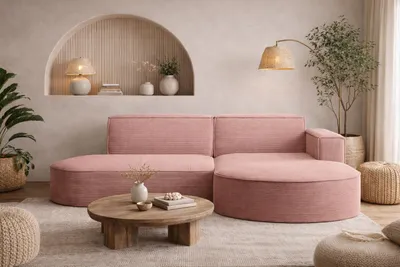 A modern living room with a pink sectional sofa, coffee table, and floor lamp.