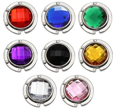 Immagine prodotto di 8 ganci per appendere borse da tavolo, ganci pieghevoli per borse disponibili in 8 colori, porta borse portatile