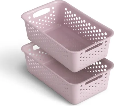 Two pink storage baskets stacked on top of each other.