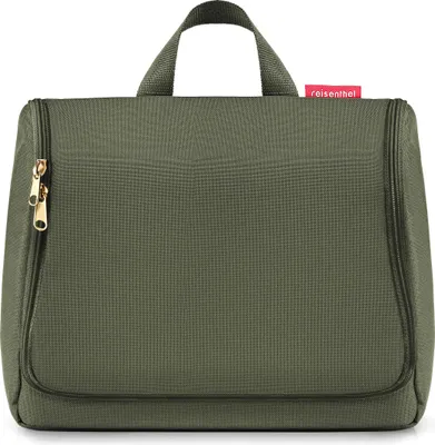 A studio shot of a green toiletry bag.