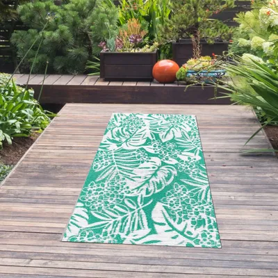 Produktbild von Outdoor-Teppich mit tropischem hauch in petrol farbe Größe - 90 x 150 cm