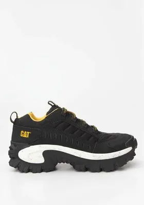A black Caterpillar sneaker with yellow accents and a white sole is shown against a white background.