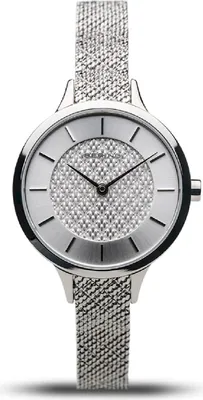 A close-up studio shot of a women's watch.