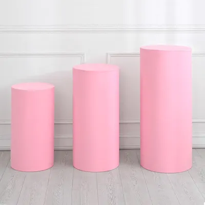 Immagine prodotto di Set di 3 copripiedistallo in Spandex rosa chiaro – ideali per feste ed eventi