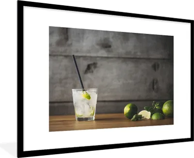 Produktbild von MuchoWow® Gerahmtes Poster Mojito-Cocktail mit Limette und Minze auf einem hölzernen Hintergrund 90x60 cm - Poster mit Schwarzem Bilderrahmen Wandposter Rahmen Foto Bilder - Wanddekoration - Fotos