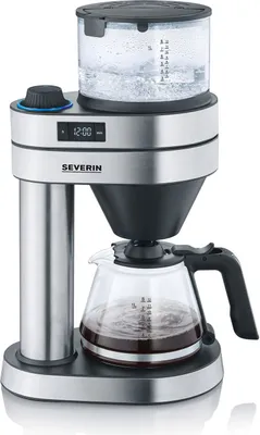 A silver and black drip coffee maker with a glass carafe filled with coffee and a clear water reservoir.