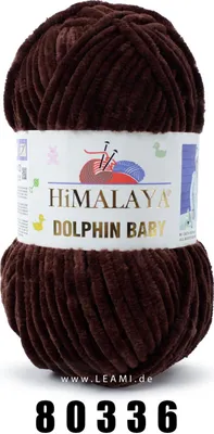 A ball of brown yarn with a label.