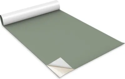 A roll of green adhesive foil with one corner peeled back.