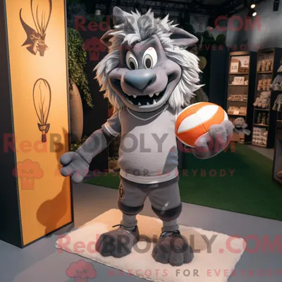 Immagine prodotto di Personaggio mascotte REDBROKOLY del diavolo grigio vestito con una maglietta da rugby e sciarpe