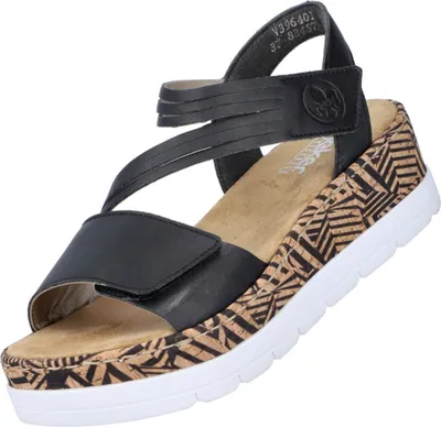 Produktbild von Rieker Damen Sandaletten Schwarz 40 EU aus Kunstleder mit Plateau, Keilabsatz 5 cm, Antistress-Innensohle, Klettverschluss, Korkoptik und extra weicher Decksohle