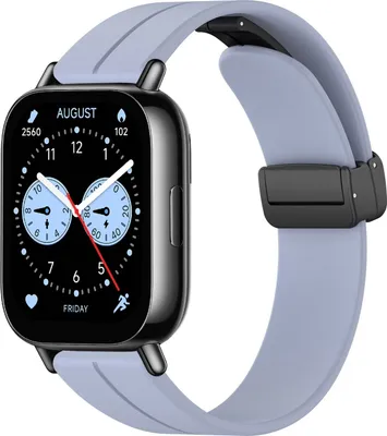 A smartwatch with a light blue strap and a black magnetic clasp is shown against a white background.