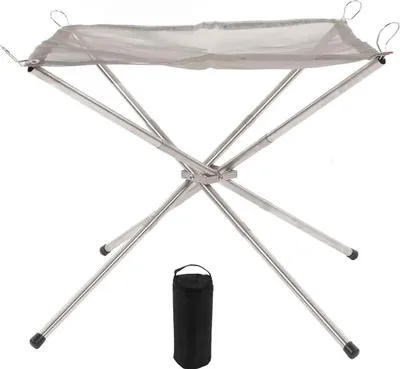 A portable fire pit and its carrying case are shown against a white background.