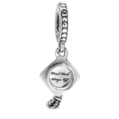 A silver graduation cap charm with text on the back.
