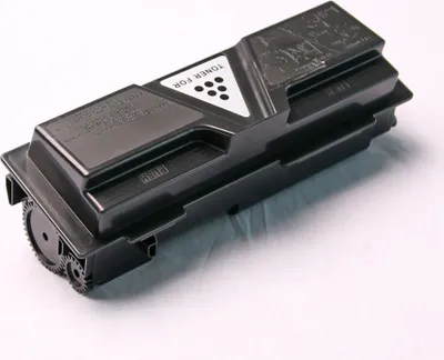 A black toner cartridge for a printer is shown on a white background.