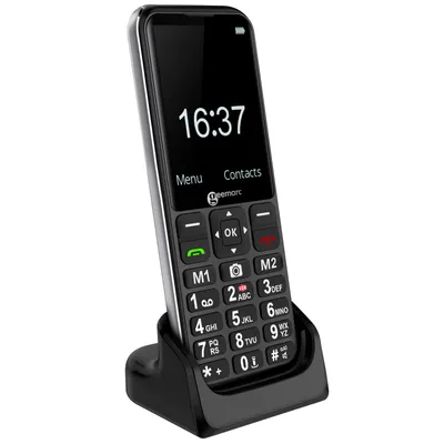 A black Geemarc senior phone is shown in its charging cradle against a white background.
