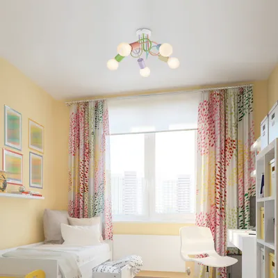 A child's bedroom with a bed, curtains, and a colorful ceiling light.