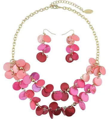 Immagine prodotto di Set da donna in rosa composto da una collana a due fili e da un paio di orecchini, con elementi in acrilico