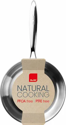 A stainless steel frying pan with a tag attached.